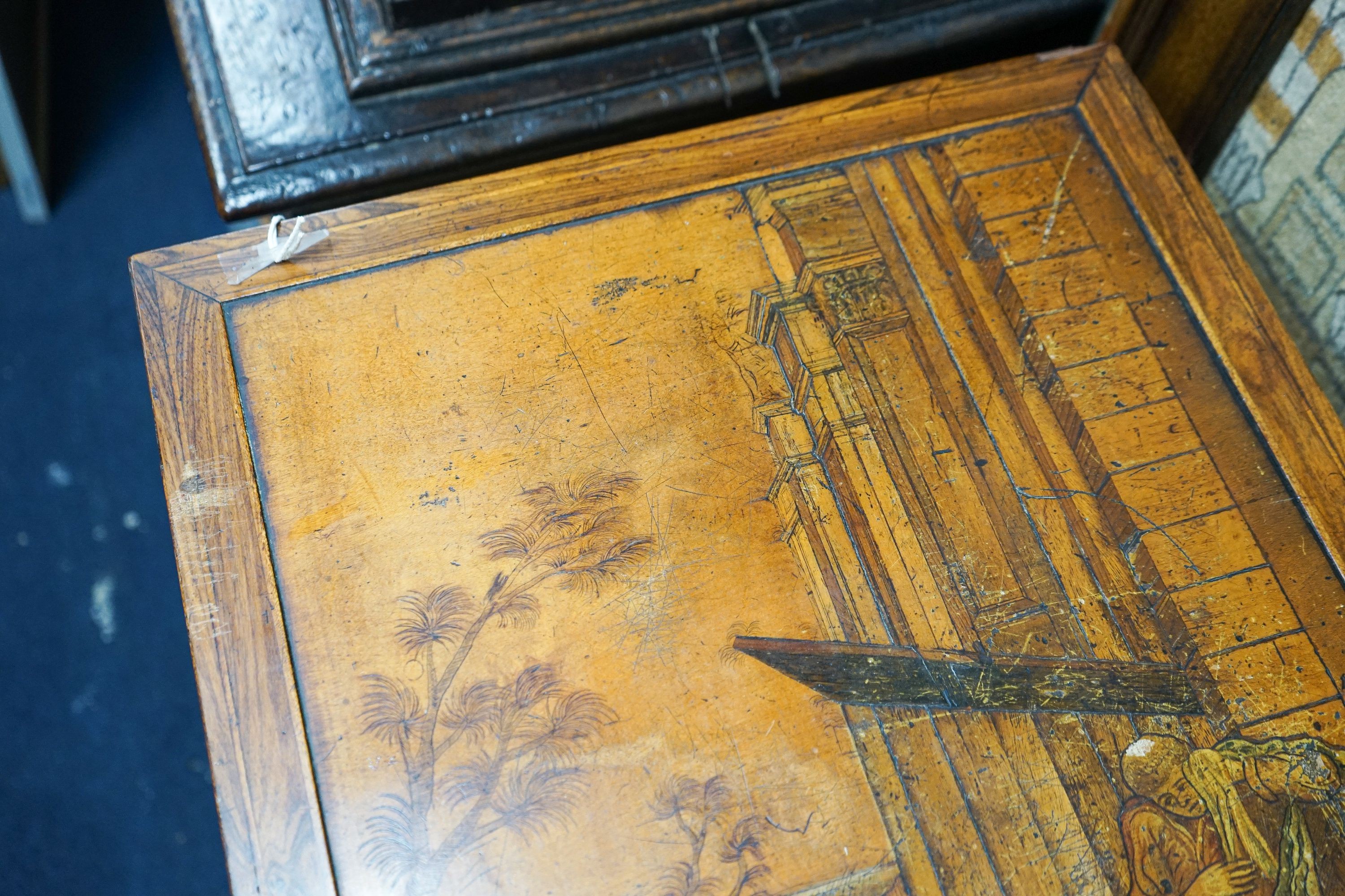 A 19th century Continental walnut side table, the top with penwork decoration and a tinted scene of figures among Roman ruins, width 41cm, depth 50cm, height 69cm